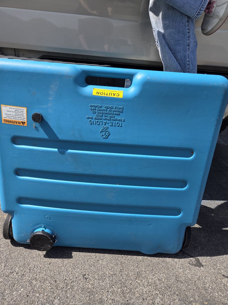 15 Gallon Camper Tote-Along Drain Tank used for storing and transporting gray and black water