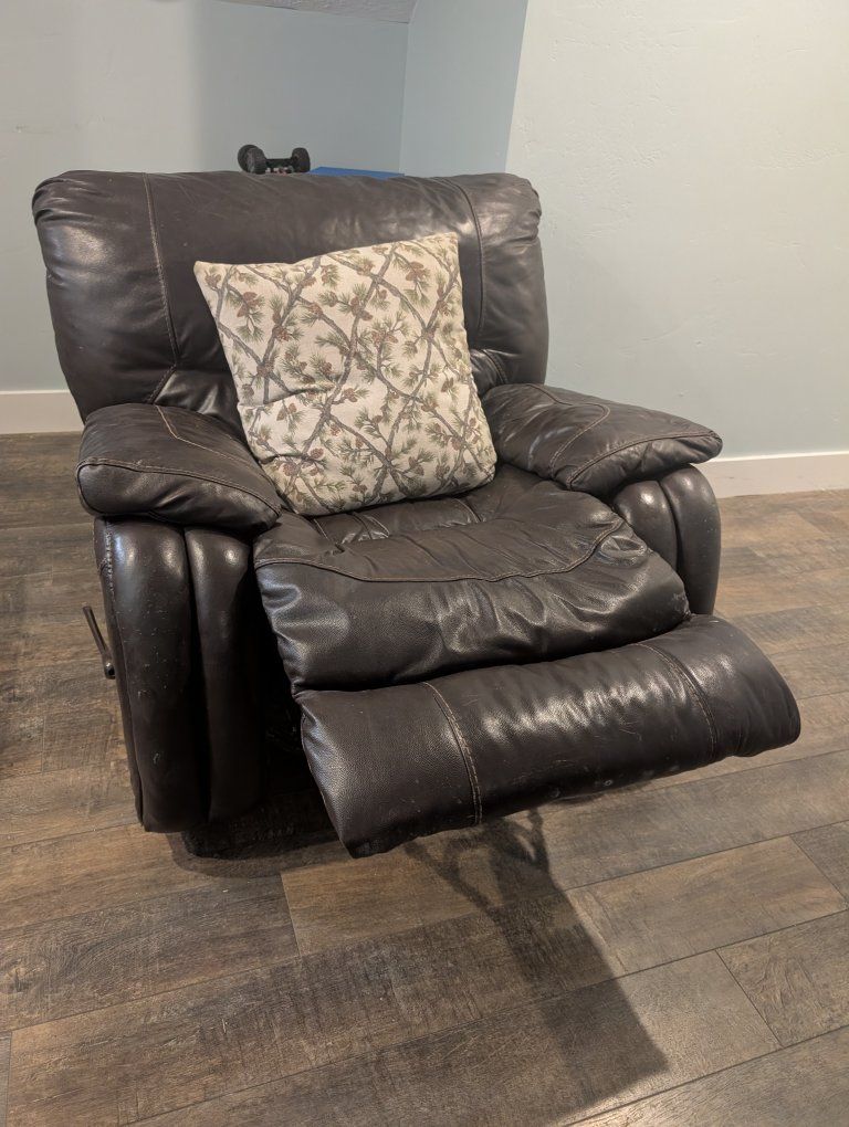 Comfortable Dark Brown Leather Recliner with Lever Reclining Mechanism