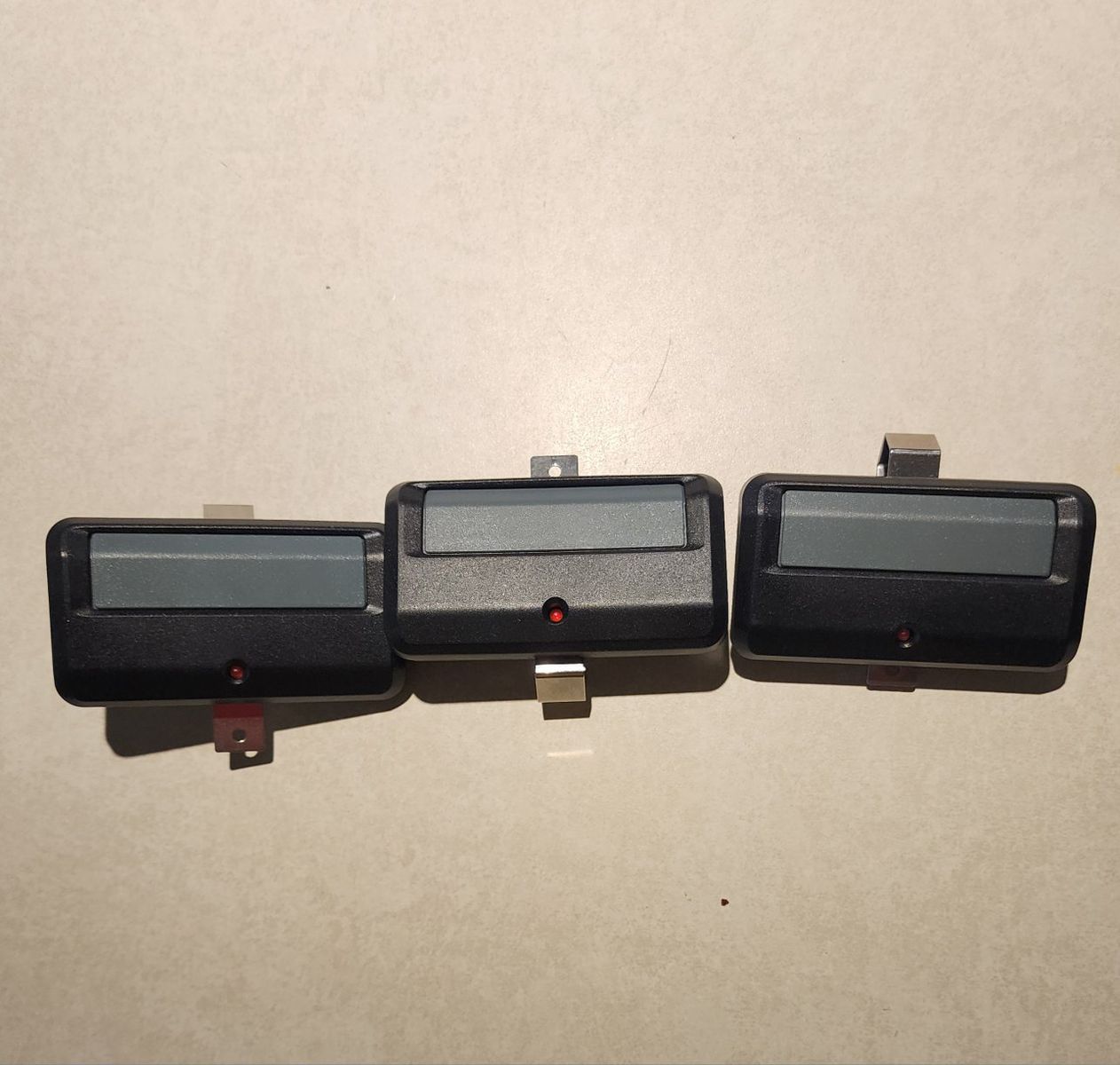 3 liftmaster Garage Door Remote Openers - Black, Gray Buttons, Visor Clips