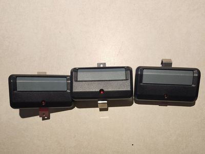 3 liftmaster Garage Door Remote Openers - Black, Gray Buttons, Visor Clips