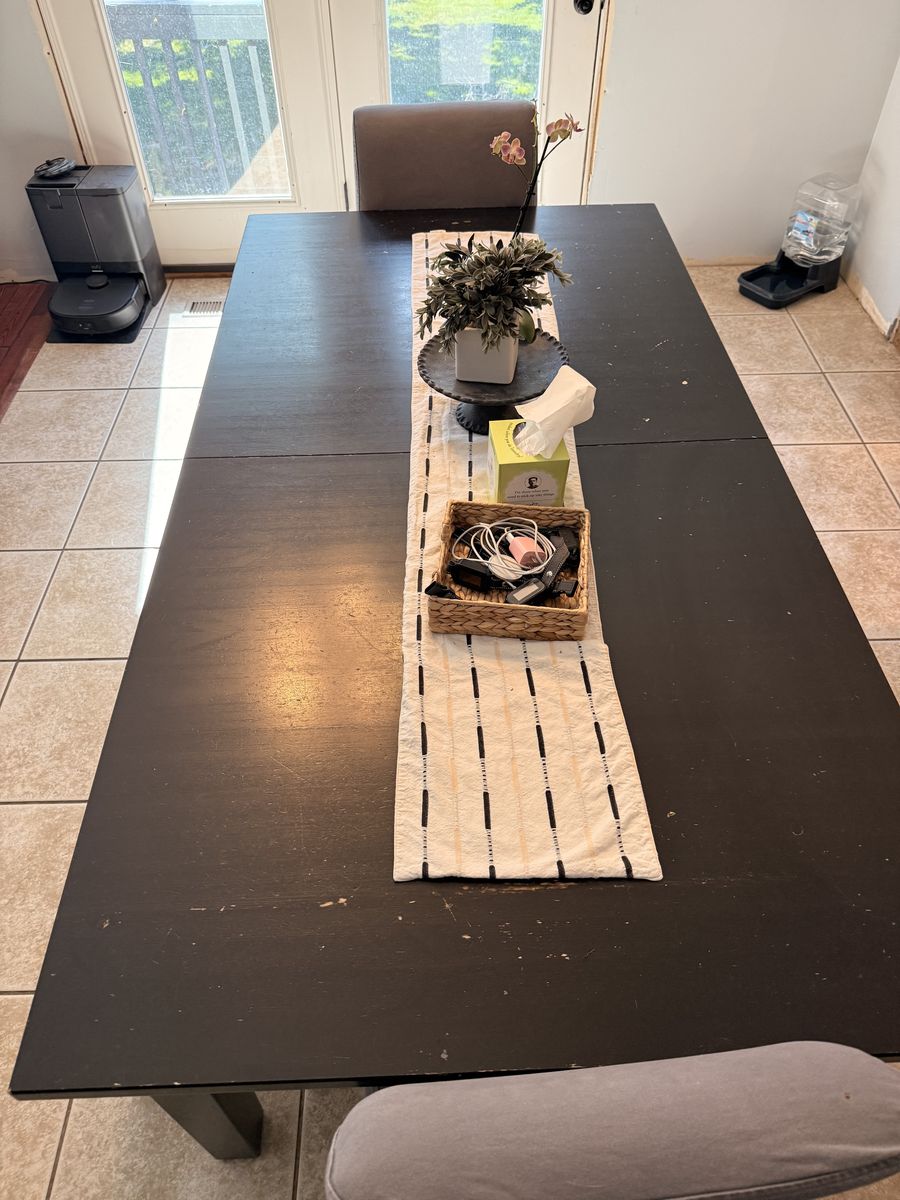 Black dinning room table with benches