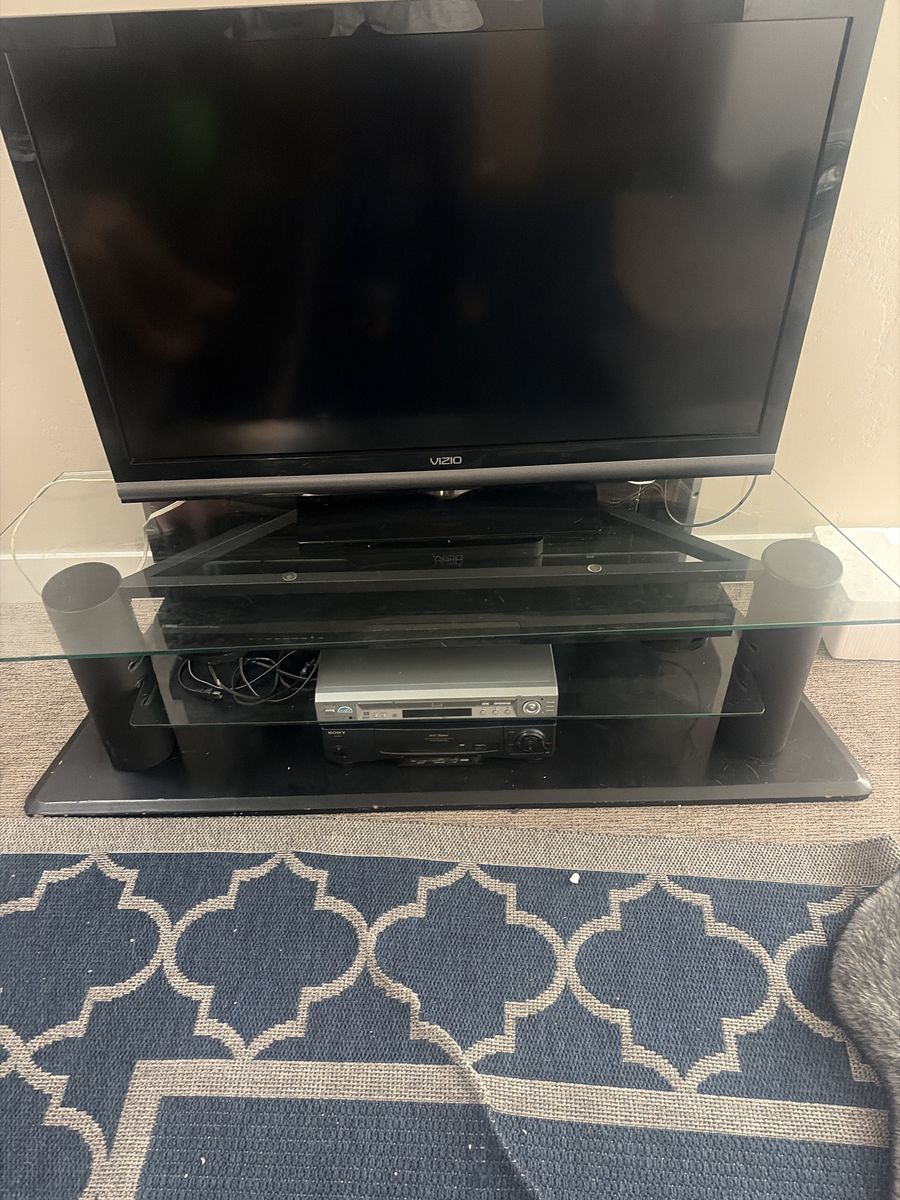 Vizio TV with Glass Top TV Stand