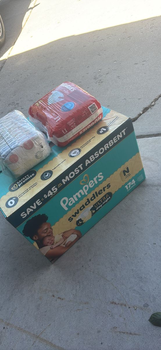 Pampers Swaddlers Newborn Diapers (174 ct) & Huggies Little Snugglers Newborn (24 ct)
