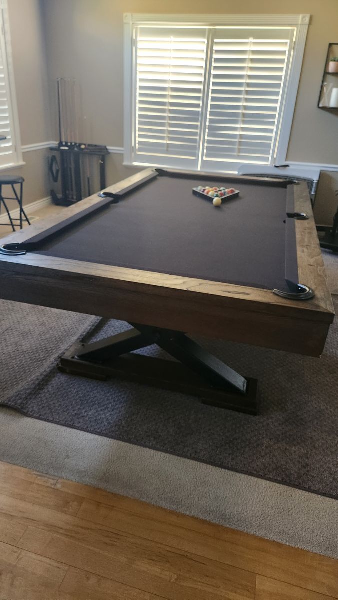 Beautiful, barely used pool table and accessories (balls, sticks, stand, cover, and also ping-pong topper)