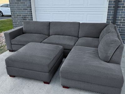 Delivery Available - Costco Gray Sectional Couch & Ottoman
