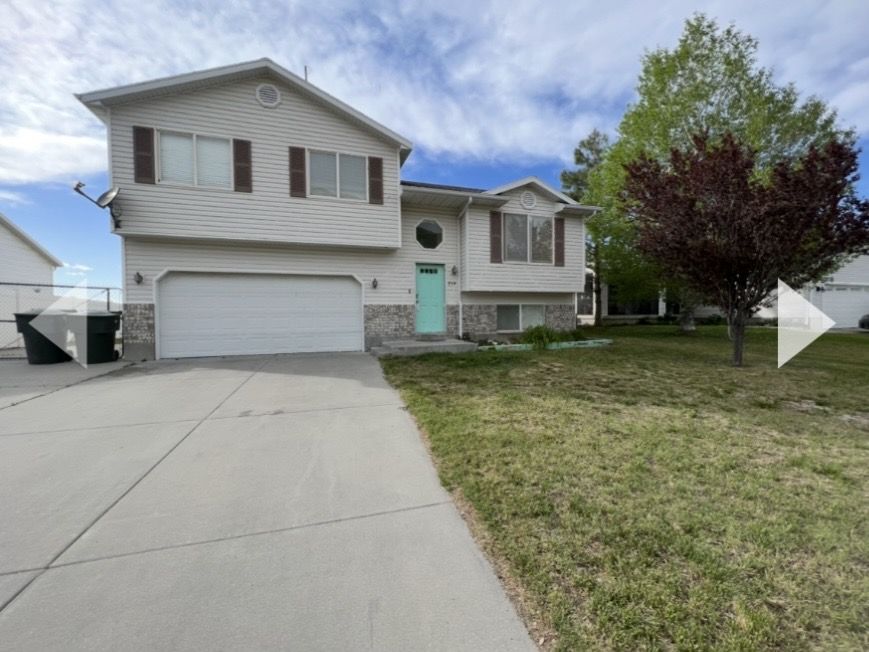 Available Now: Four Bedroom home with yard