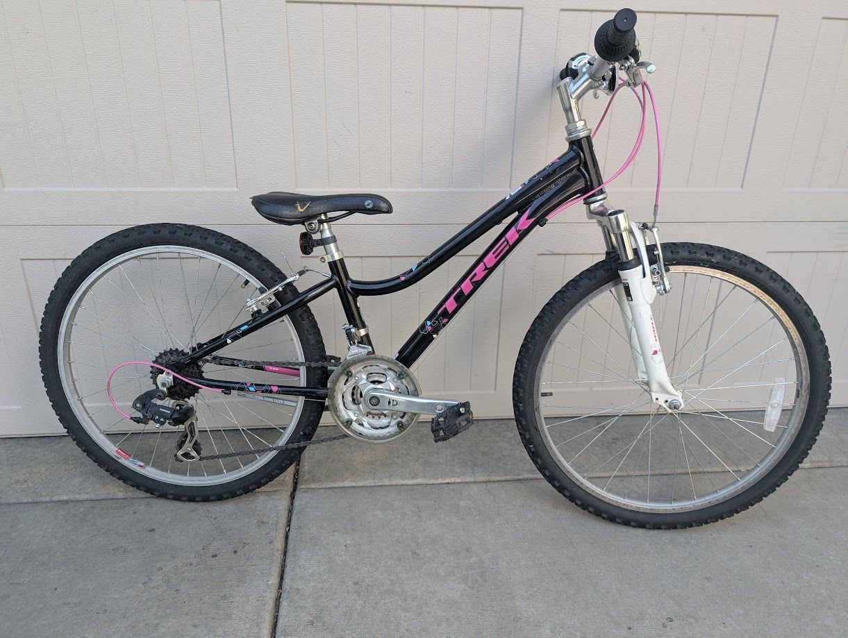 Trek MT220. 24" wheels, 21 speeds, shocks.