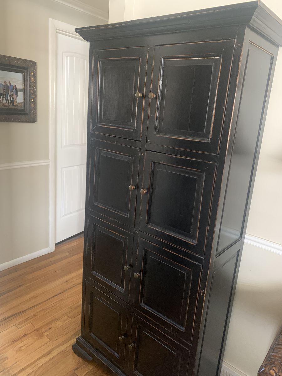 Cabinet With 8 storage areas.