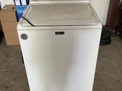Whirlpool White Electric Dryer - Top Load bought last year new. Dryer is older with new heating element