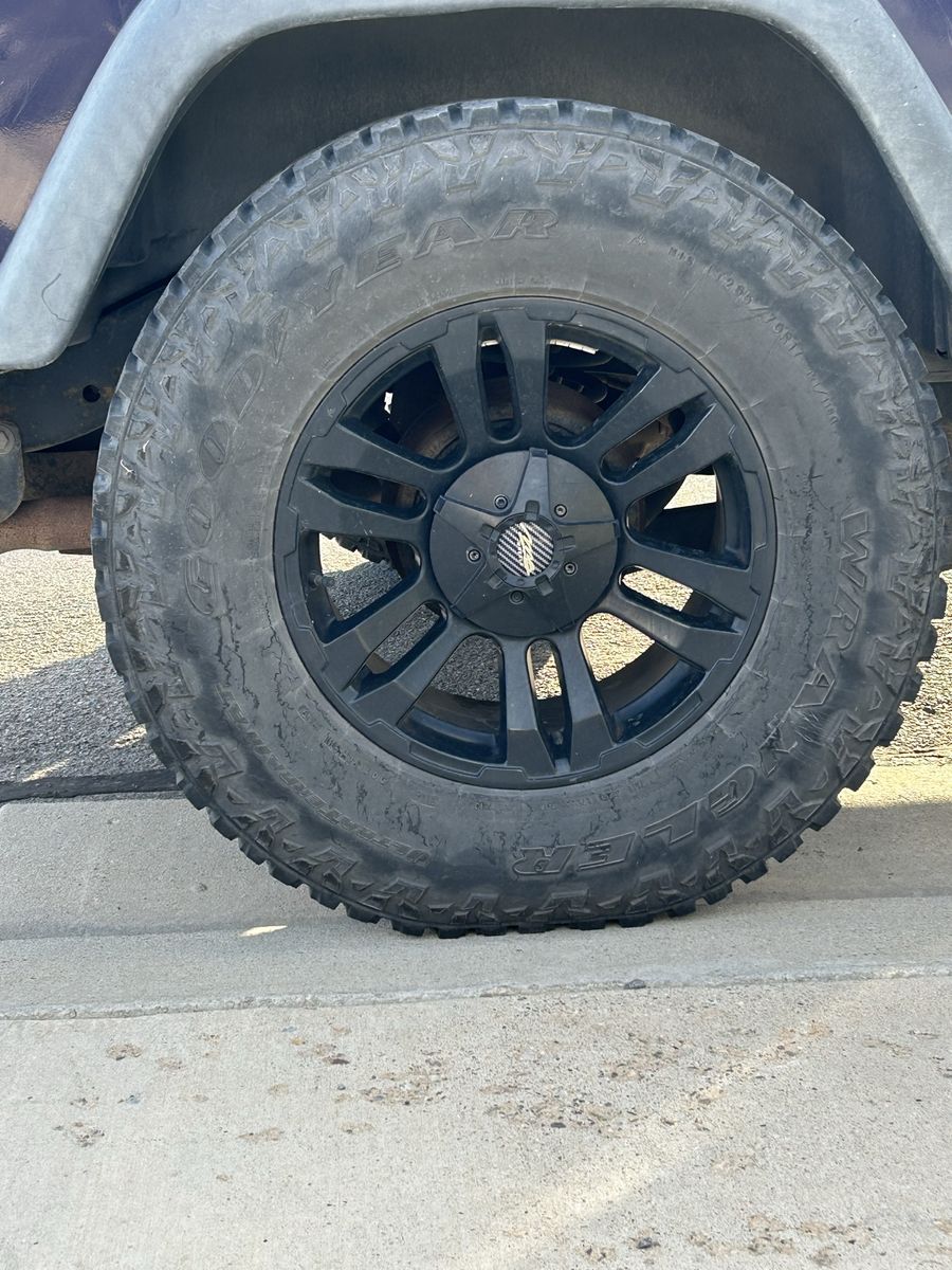 Jeep Wrangler Tires- Goodyear Wrangler UltraTerrain AT Tires with Rims - LT285/70R17