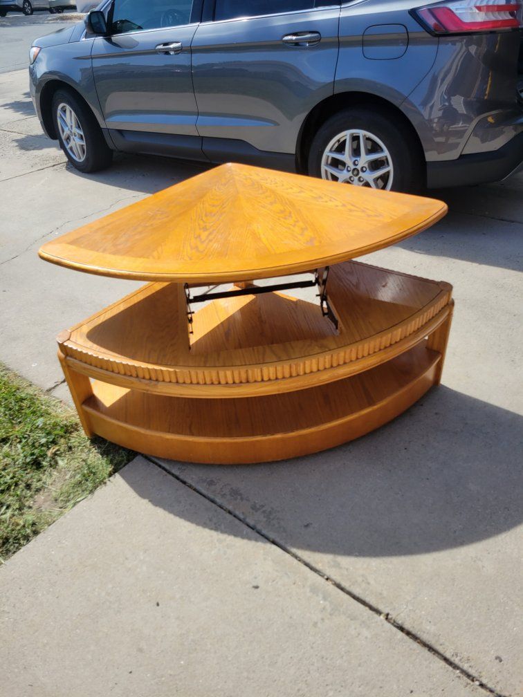 Rising coffee table. Solid wood all mechanics in great shape.