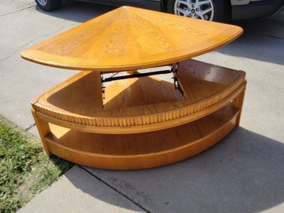 Rising coffee table. Solid wood all mechanics in great shape.