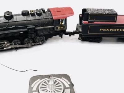 I have a lionel o scale Pensilvania flyer comes with (3 cars, oval of track with remote and power cord)