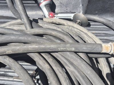Continental Heavy-Duty Black Rubber Garden Hose with Nozzle Attachment 2 sets of 50' long $30 each