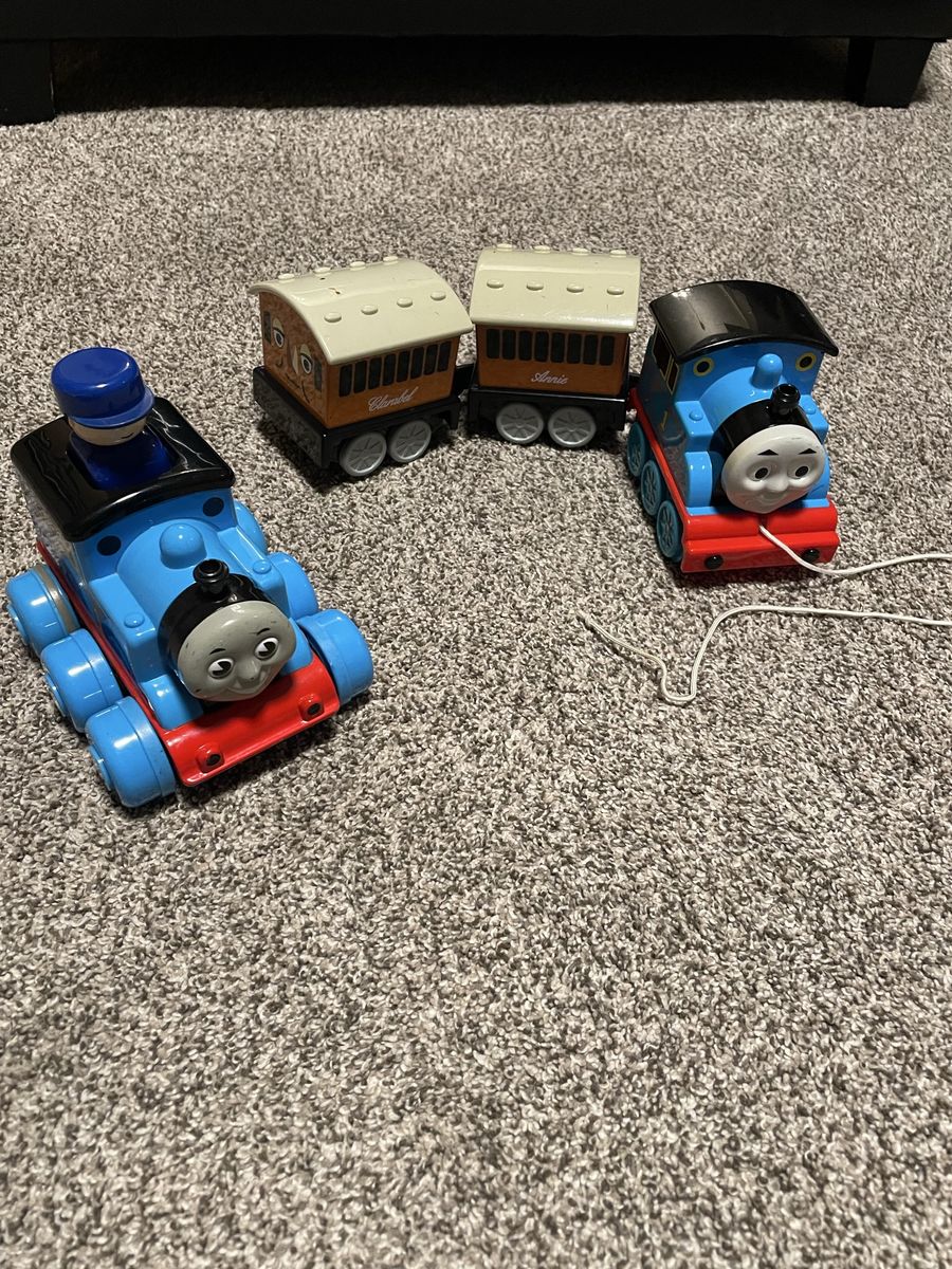 Vintage Thomas the Tank Engine with Annie and Clarabelle pull toy 1997. Vintage Thomas the Tank Engine 2004 push  and go train.