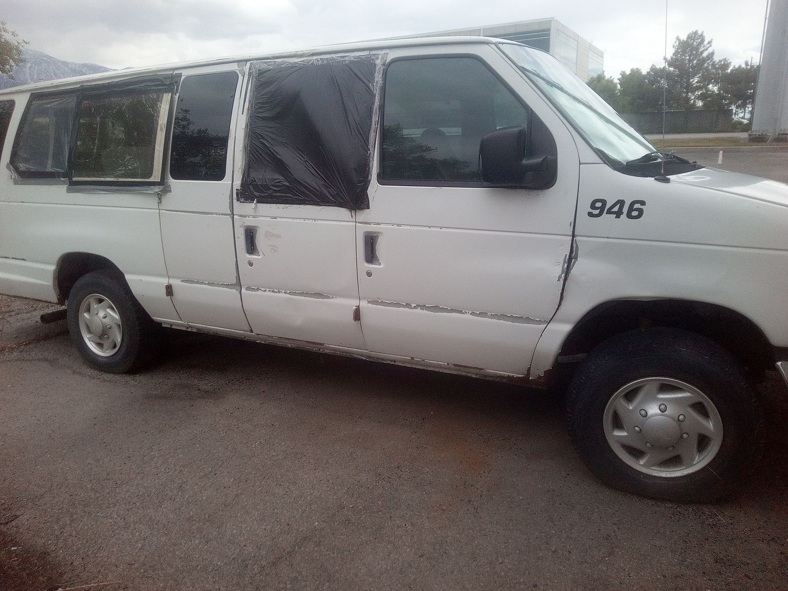 White Ford Parts Van