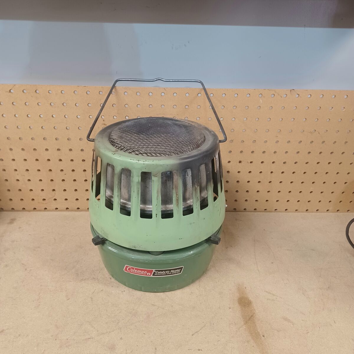 Coleman heater. Avocado style 1972