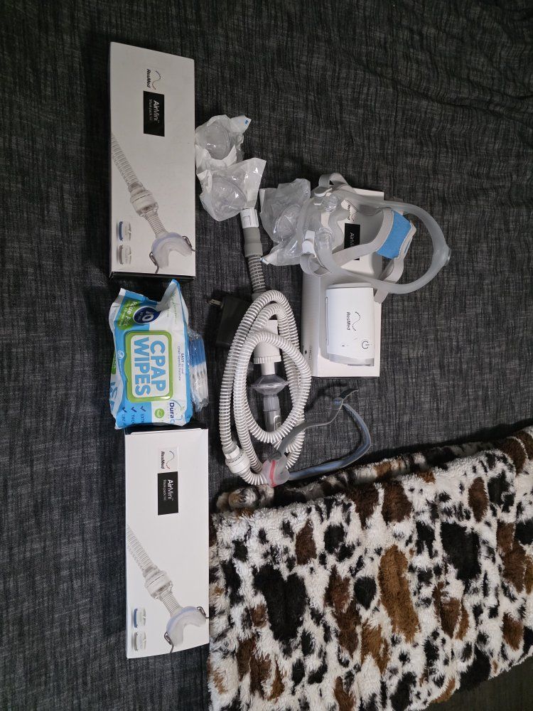ResMed AirMini AutoSet Travel CPAP Machine with AirFit P10 Mask & Accessories extra masks hoses  Used once basically new
