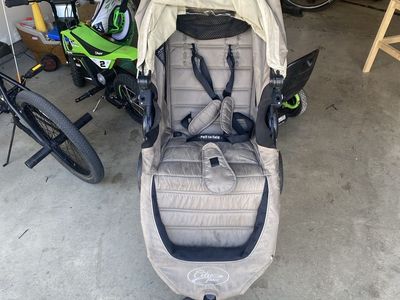 Stroller with stand up attachment