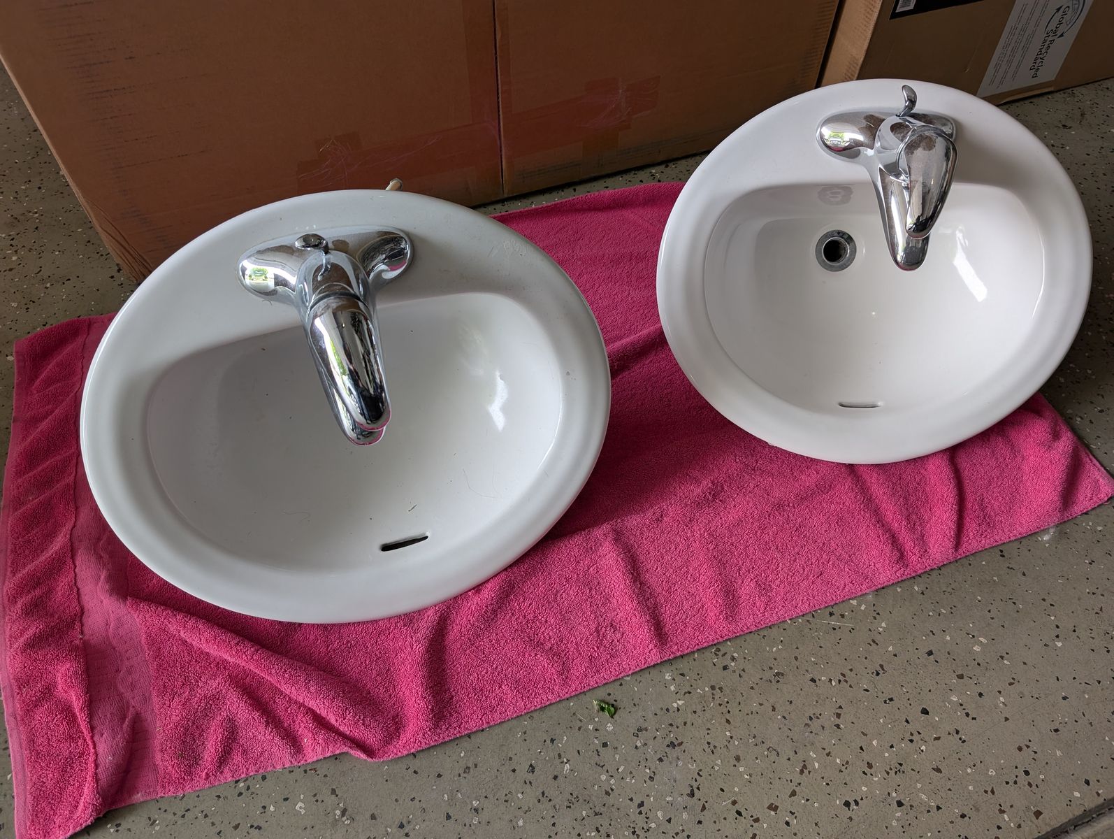 Two White Ceramic Sinks