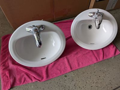Two White Ceramic Sinks