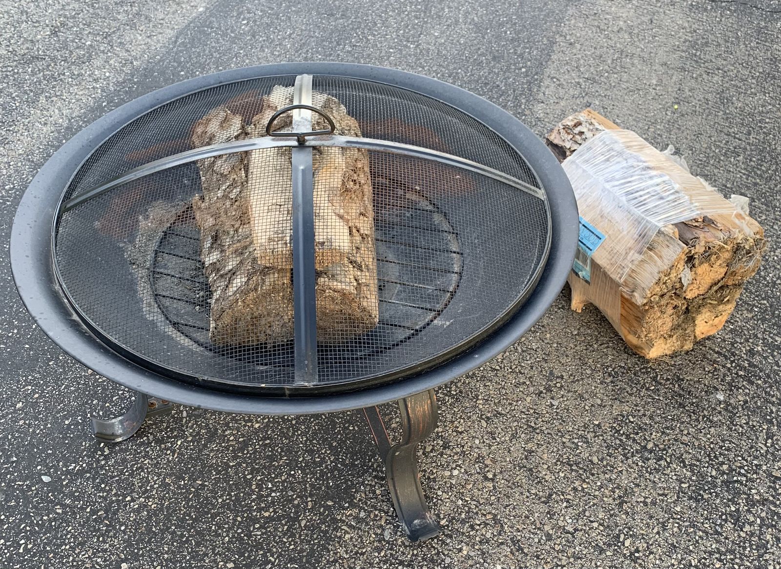 AWESOME FIRE PIT W/ NEW PACK OF WOOD
