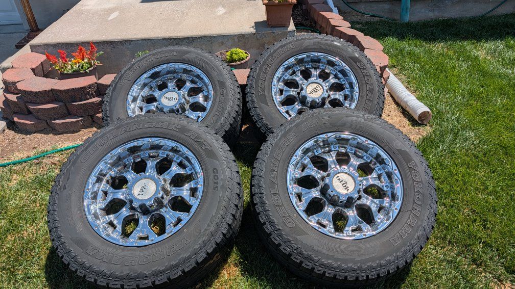 Used All-Season Truck Tires with Chrome Rims - about half Tread, Set of 4 with lug nuts