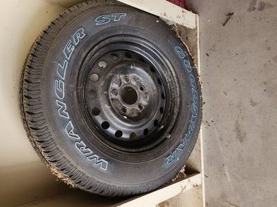 Goodyear Wrangler ST P225/75R16 Tire & Rim