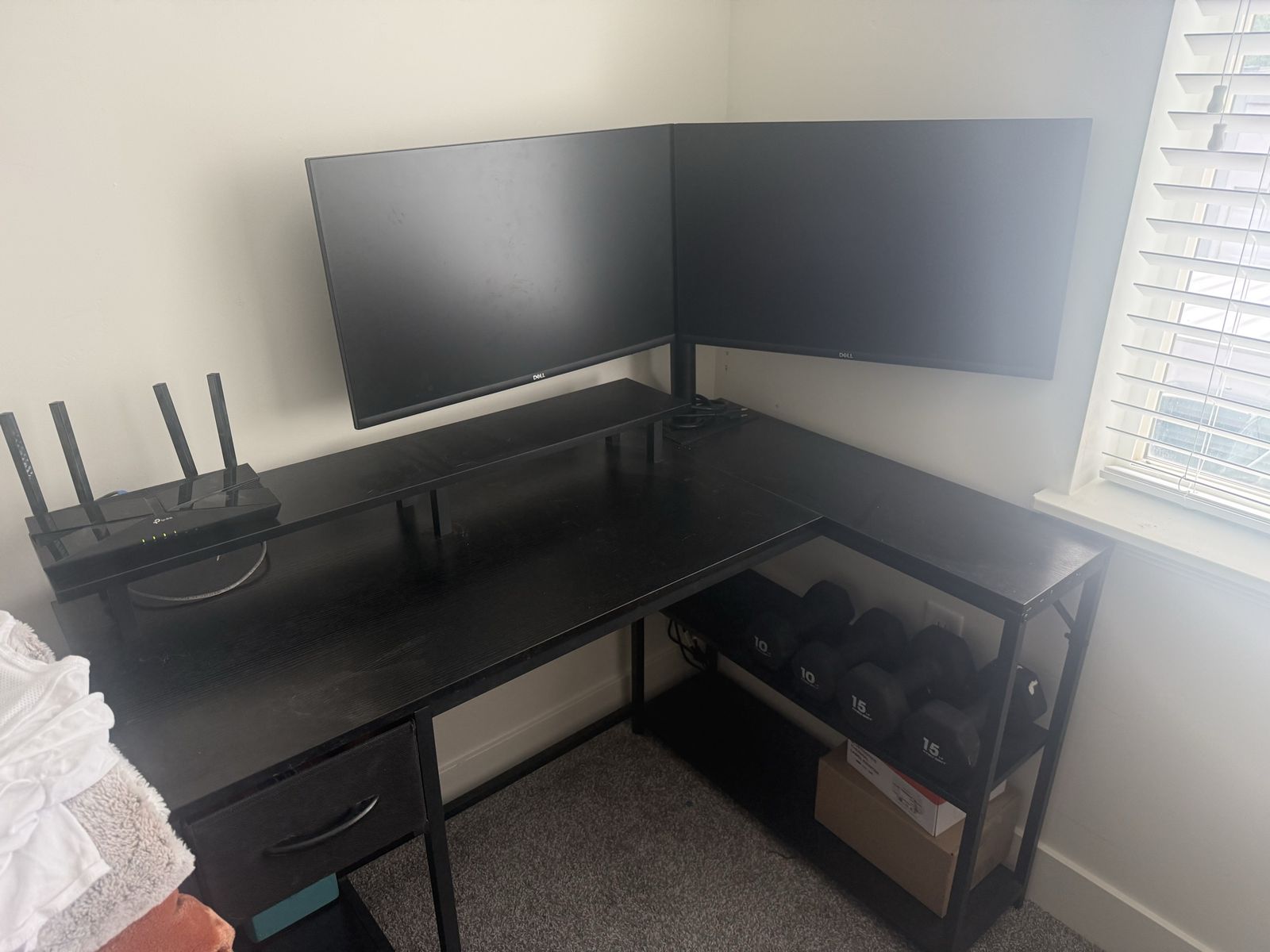 Black L-Shaped Computer Desk with Monitor Stand and Drawer set up