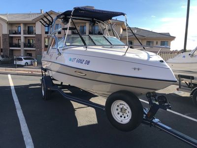4 Winns Cuddy with 225 hp outboard