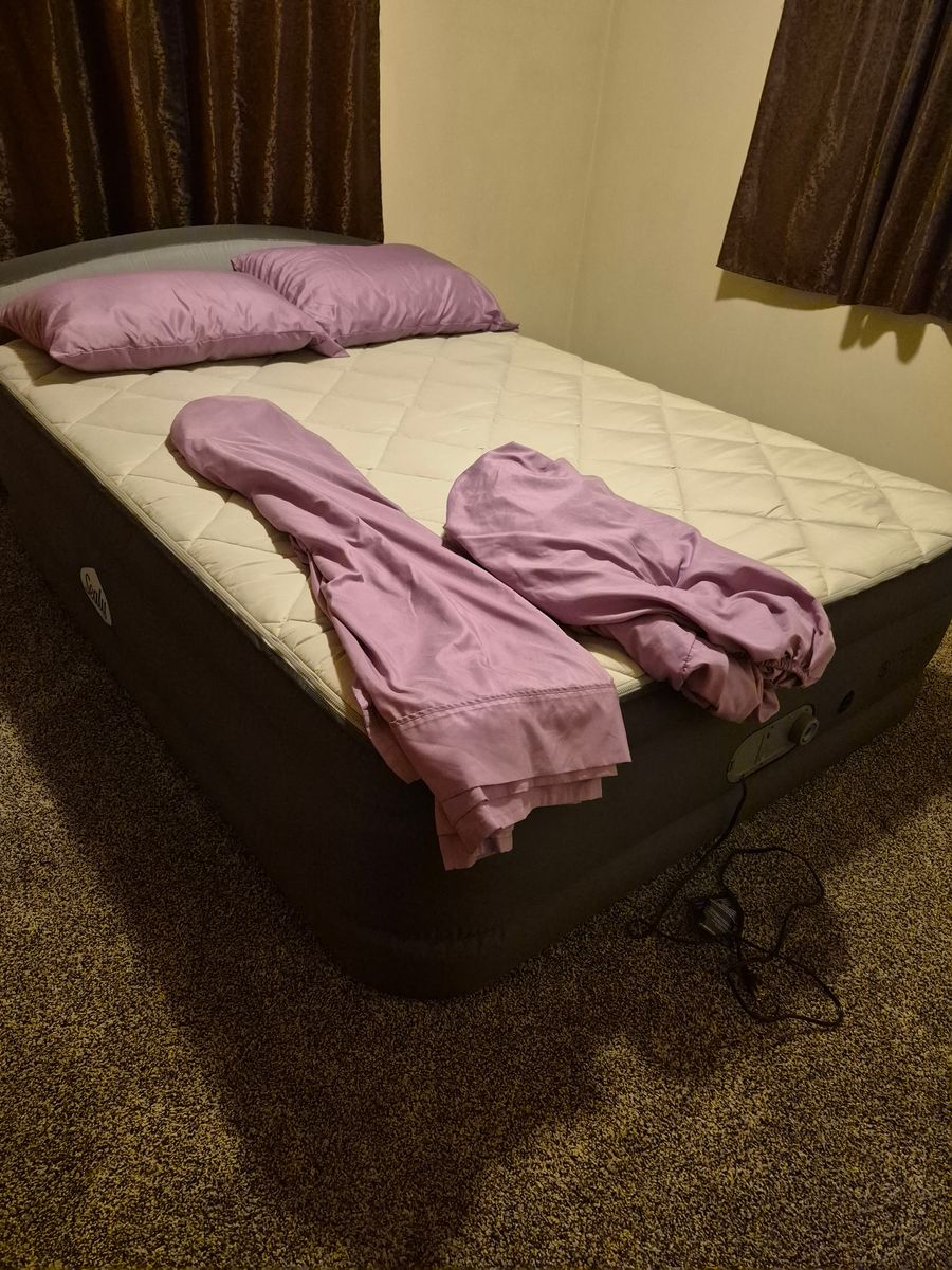 Sealy Air Mattress with Built-in Pump and Purple Sheets