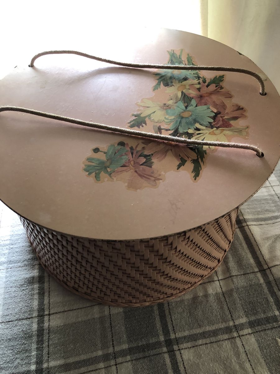 Vintage Woman's wicker hat holder.