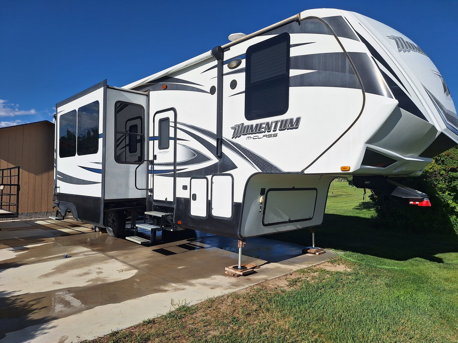 2015 Grand Design Momentum M-328M fifth wheel toy hauler