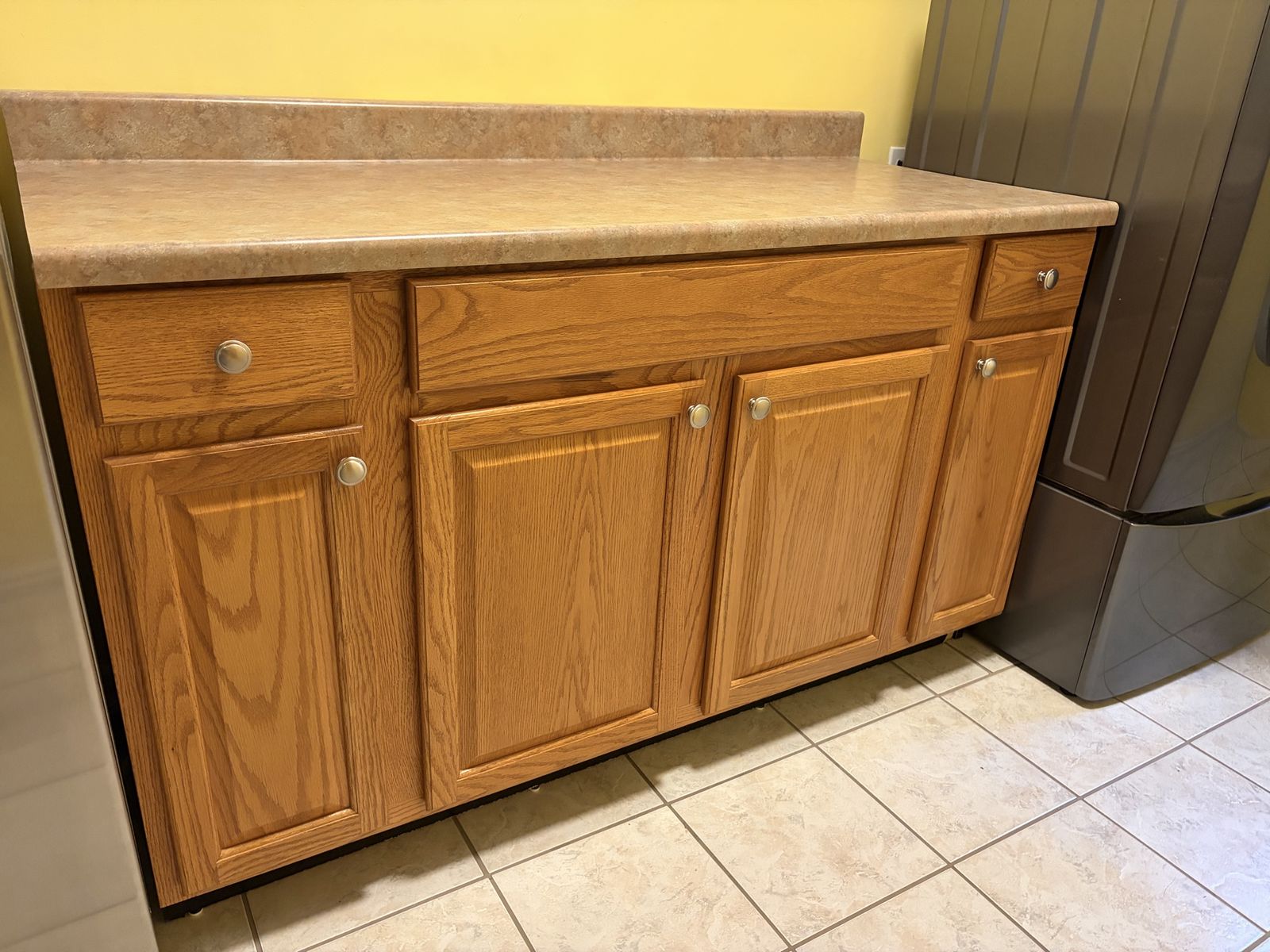 Oak Finish Cabinet with Laminate Countertop - Excellent Condition, 4 Doors, 2 Drawers
