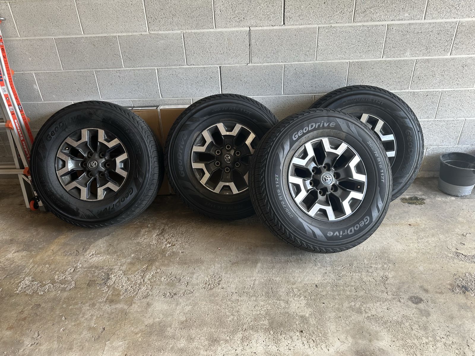 Toyota Tacoma 16-inch Rims with 265/70 R16 112T Tires (Set of 4)