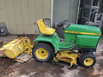 John Deere 300 garden tractor with rototiller