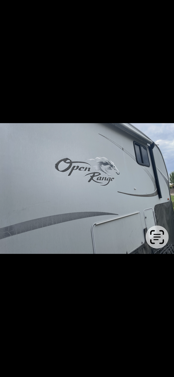 Open Range 385 RSL 4-slide 5th wheel camper trailer.