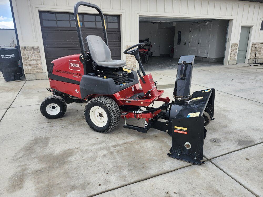 Toro 3280-D mower with snow blower and broom