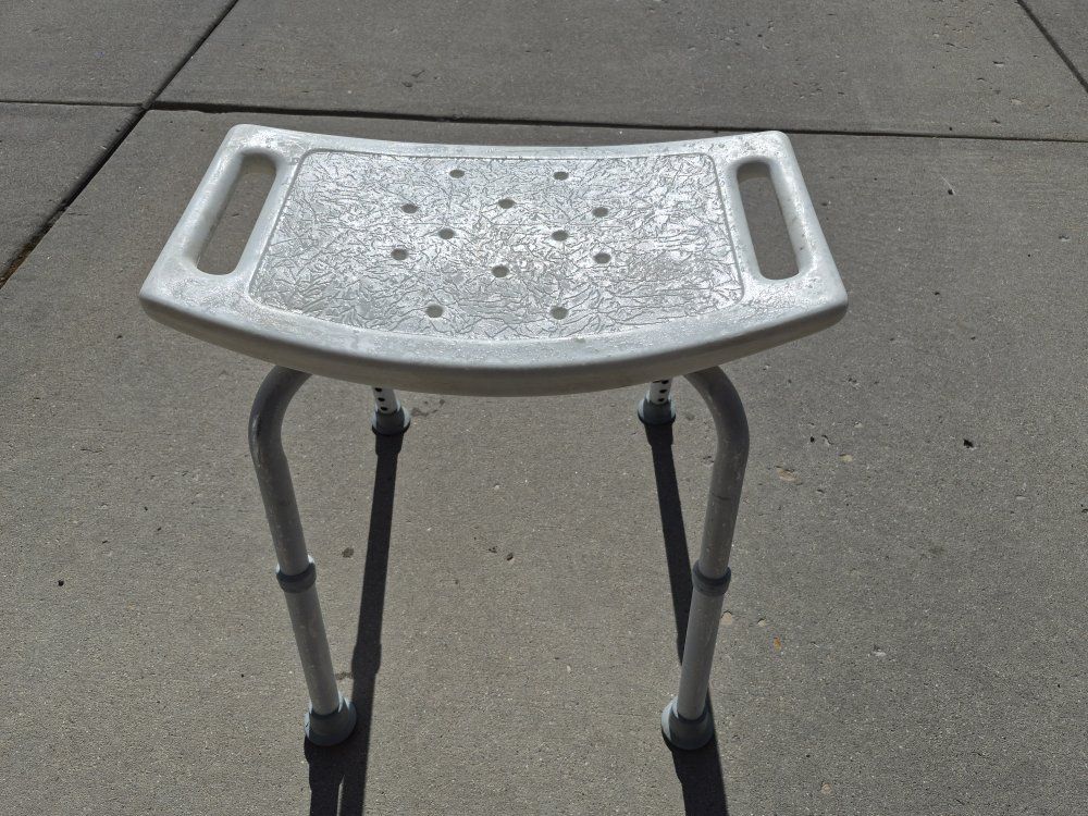 Free adjustable shower stool