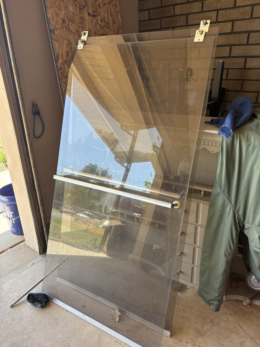 Pair of Tempered Glass Shower Doors – 30” × 56” – $170