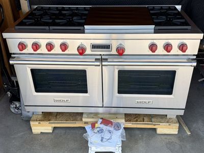 Like-New WOLF 60” Dual Fuel Range with French Top