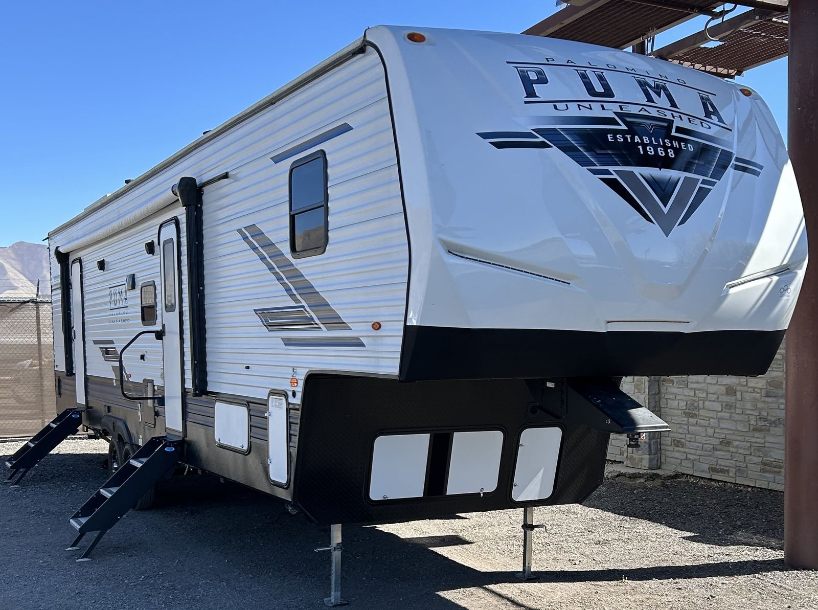 2024 Palomino Puma Toy Hauler 12-foot cargo garage patio rails entrance 88"x88" 4 Seasons,  sleeps 10, front/rear power jacks