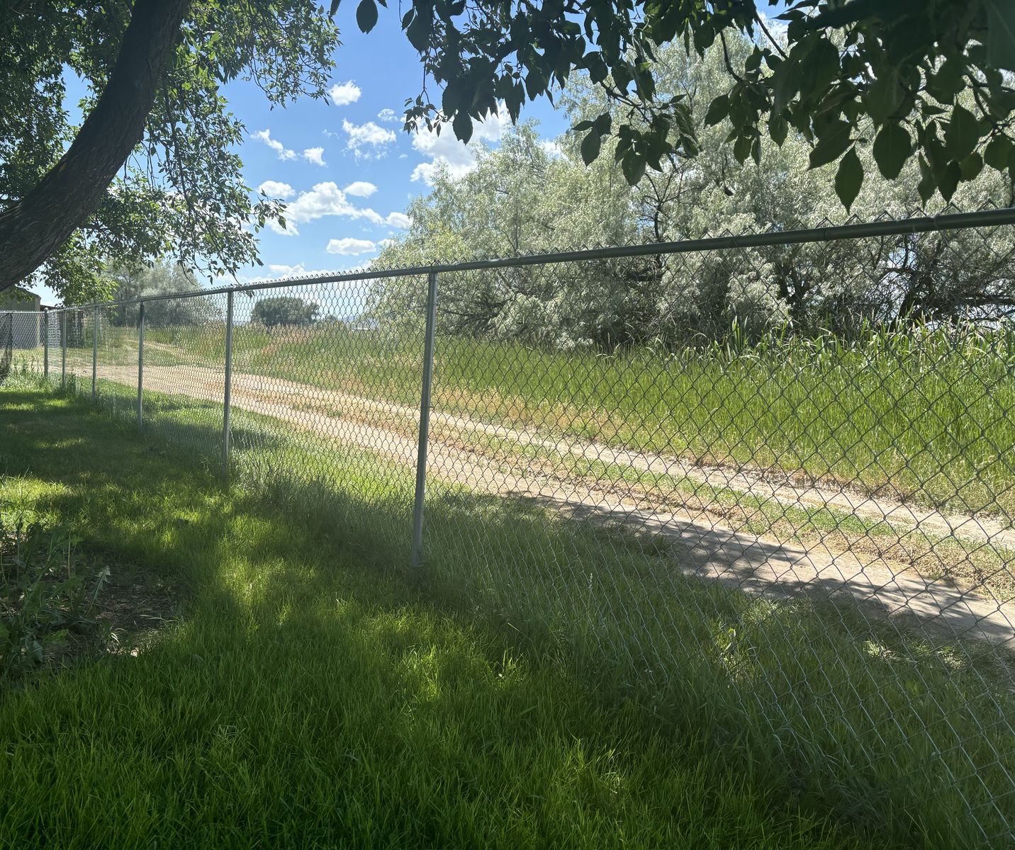 Two rolls Of Chain-link fence. 142 ft total