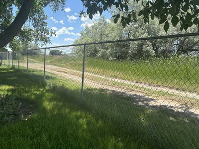 Two rolls Of Chain-link fence. 142 ft total