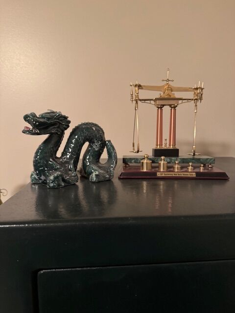 Dragon and scale with weights