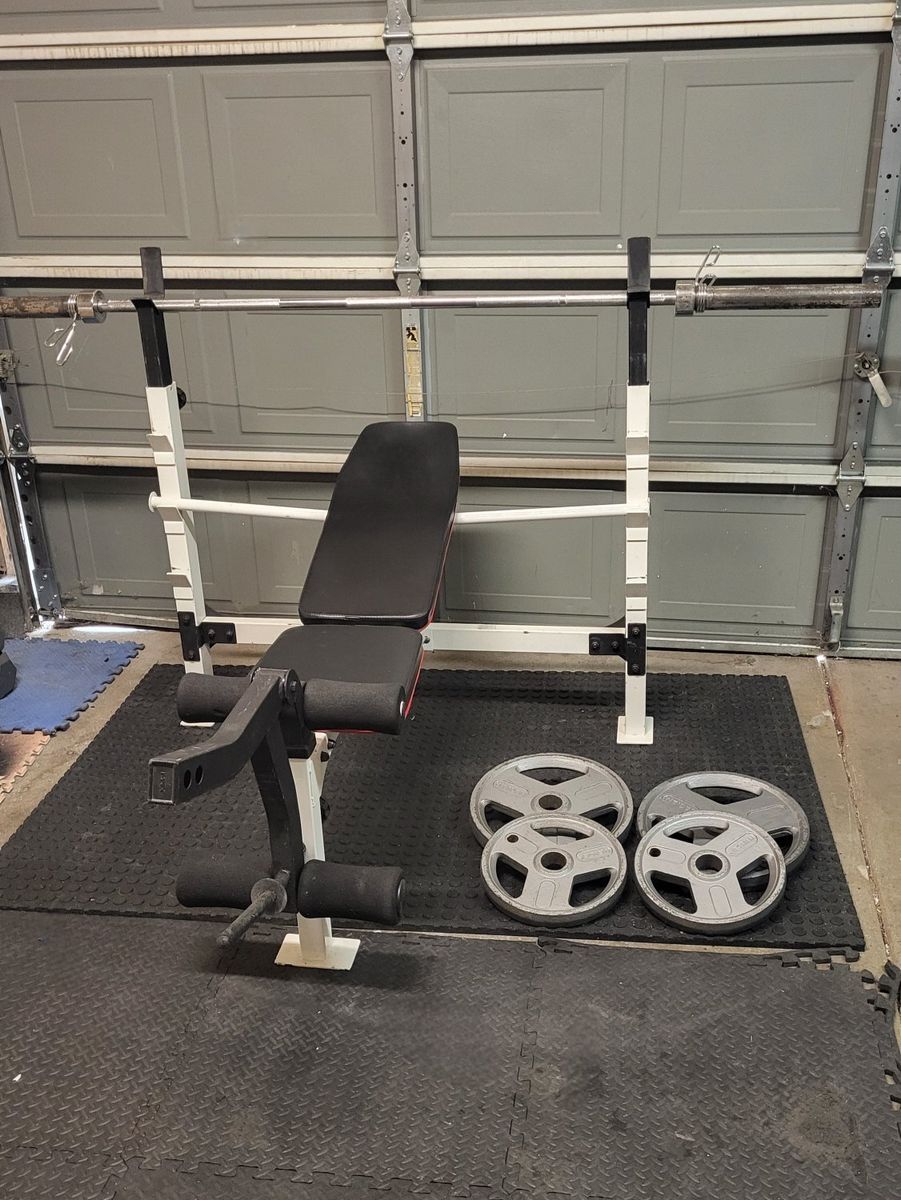 Bench and 120 pounds of weights
