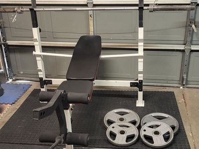 Bench and 120 pounds of weights