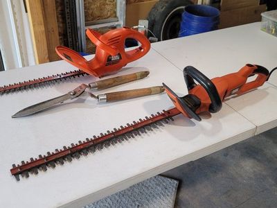 All for $40! 2 Black and Decker Electric Hedge Trimmers and 1 Hand Trimmer