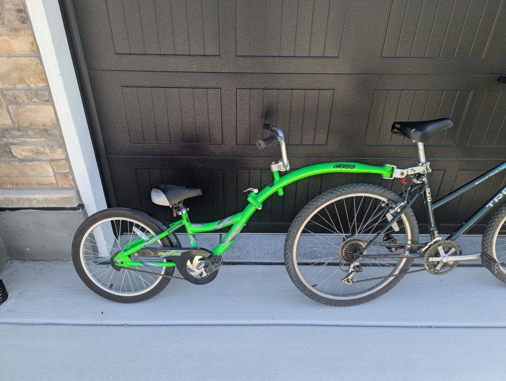 Kids ride tag along bike attachment trailer copilot wee ride