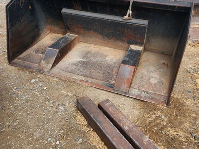 Aim Roll Out Skid Steer Bucket